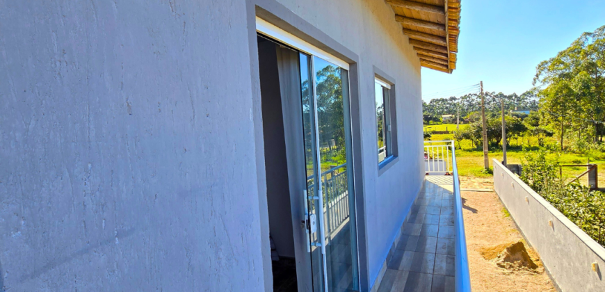 Casa em Imbituba localizada no bairro Ibiraquera á 500 metros até a lagoa