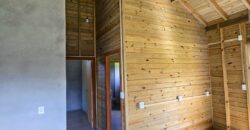 Casa com galpão á venda em Imbituba, localizado no bairro Arroio