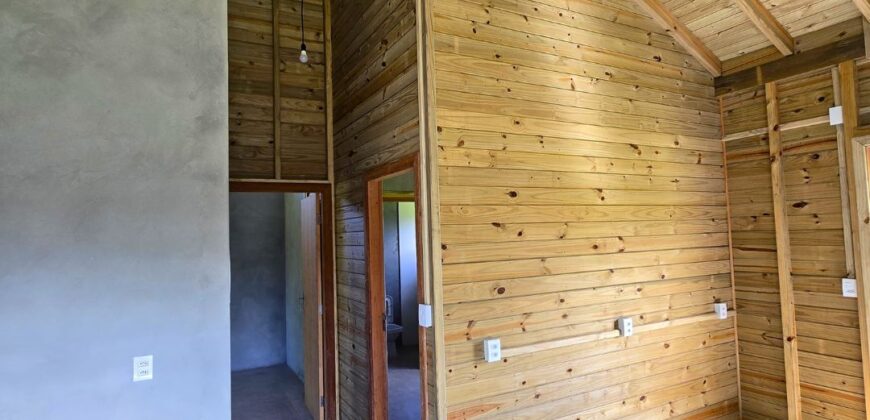 Casa com galpão á venda em Imbituba, localizado no bairro Arroio